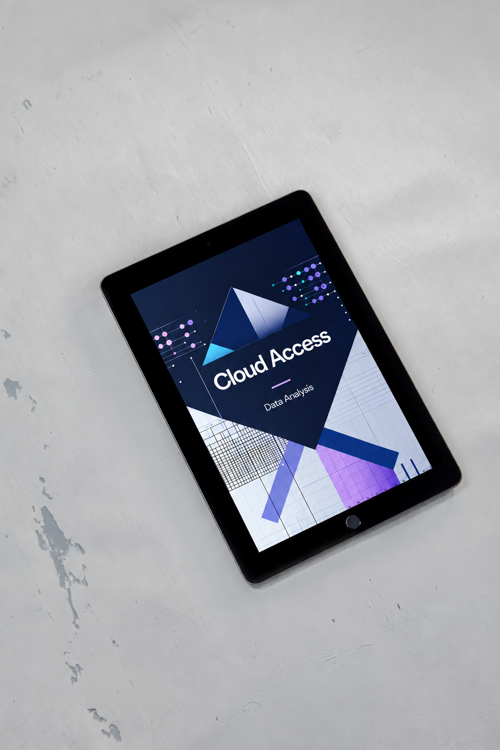 A black tablet device lying on a light gray textured surface, displaying a screen with the text 'Cloud Access' and geometric blue, purple, and white graphics.